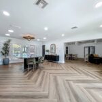 Clubhouse entry space with reception desk and seating